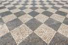 Tomar, Portugal. Typical patterned cobblestone walkways Art Print